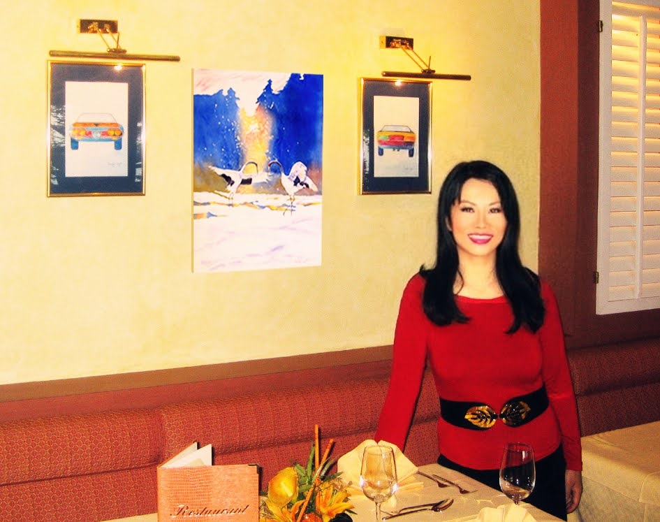 Jennifer with her paintings